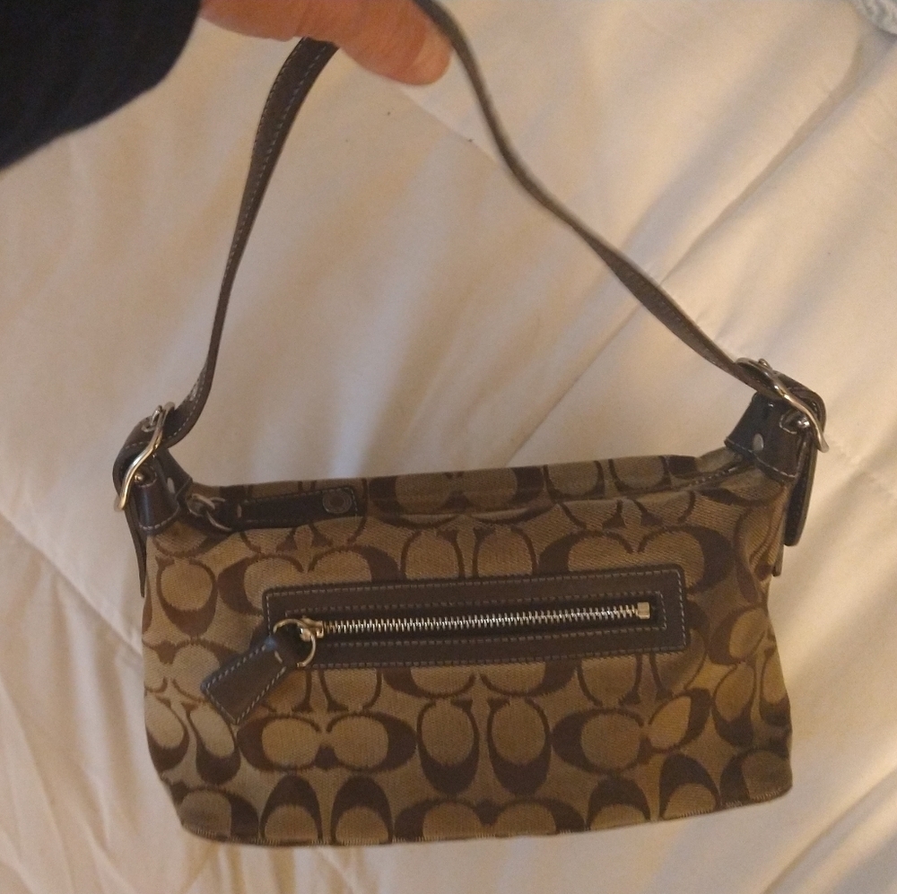 Small child size Coach bag strap is 20" in length